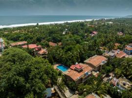 De Mandarin Beach Resort Suites & Villas, Candolim，位于坎多林的酒店