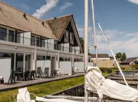 Luxury Townhouses in Heeg (6 & 8 Guests) with Roof Terrace, Views & Private Dock on the Heegermeer