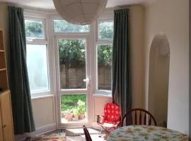 Victorian house in front of a park