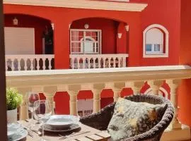 Apartamento rojo con vistas al mar