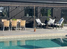 Villa Golfgatan 32 Vintrosa Lanna，位于Vintrosa的酒店