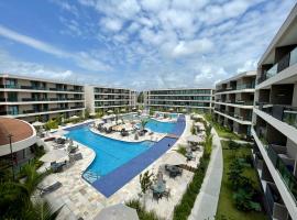 Flat Muro Alto - Vista piscina principal，位于伊波茹卡的酒店