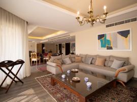 Luxury Rooms in the Heart of Pyramids，位于Kafr Ghaţāţī的自助式住宿
