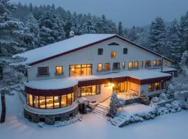 圣马尔特酒店，位于白马村的带热水浴缸的酒店