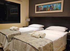 Hotel Grand Lago，位于波萨达斯的酒店