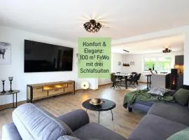 Ferienhaus Höckelheim - Savanna Lodge - barrierefrei - 3 Schlafzimmer-bis 6 Gäste - nahe Göttingen - 100 qm - Babies reisen gratis - Terrasse, Garten & Grill - vollausgestattete Küche mit Spülmaschine - Klimaanlage, Fußbodenheizung & Raffstores
