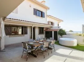 Beach Villa with Jacuzzi & Garage by HostWise