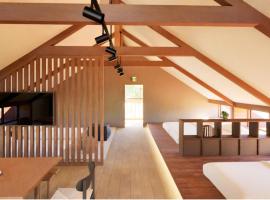 库拉萨科温泉樱花度假屋，位于南小国町的酒店