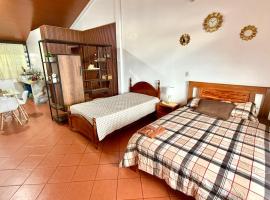 Suit estilo Americano，位于普约的酒店