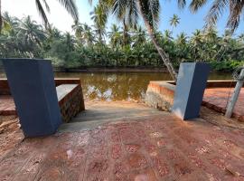 Harsha's River View 8-Bed Mixed Dormitory Room，位于Mūlki的酒店