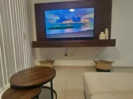 Ground floor condominium at the foot of the pool