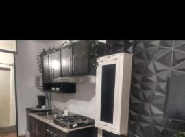 Mini departamento Aire acondicionado y factura，位于La Armonía的酒店