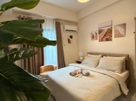 Cozy 1BR in Zef, Near Anjo World Wifi, Pool, Gym，位于Minglanilla的酒店