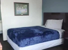 Queen Bed Hotel Room 229