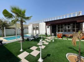 The home 2，位于Wāsiţ的酒店