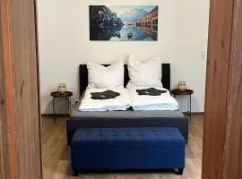 Five O - Businessapartment Precht - QueenSize Bett