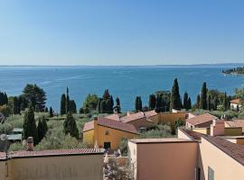 普瑞同公寓式酒店，位于加尔达的酒店