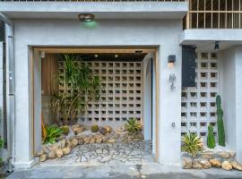 台南晒木民宿，位于安平区的酒店