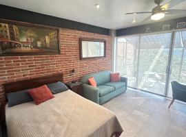 Brick Box Studio con Terraza，位于Hércules的酒店