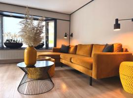 Gezellig chalet met 2 slaapkamers aan bosrand，位于Erm的酒店