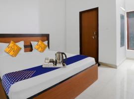 SPOT ON 42401 hotel Divine farm，位于阿里格尔的酒店