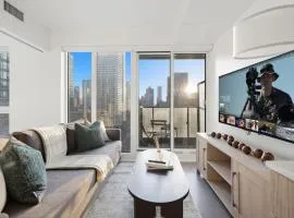 Bright 2BR Condo w Patio Central Toronto Retreat