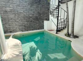 Casa con alberca en el centro de Puerto Progreso，位于普罗格雷索的别墅