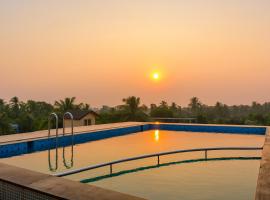 Baga Hol!days Beach Home Stay，位于巴加的乡村别墅