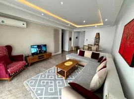 Abilia Suite - À Proximité de l'Aéroport - Confort et Élégance