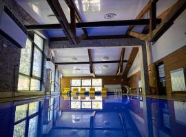 超级滑雪场酒店，位于卡夫尼克的酒店