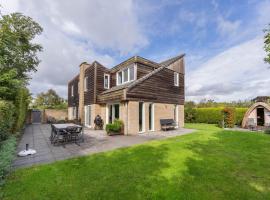 Luxe vrijstaande recreatiewoning met tuinsauna，位于De Cocksdorp的酒店