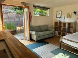 Self-contained studio with patio