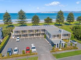 花落金沙海滨汽车旅馆 ，位于吉斯伯恩的酒店