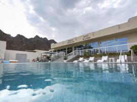 paradise resort and spa，位于八田的酒店