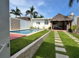 Casa Gaviota Casa Con Alberca y Palapa，位于特克塞丁戈的酒店