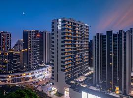 喆啡酒店，位于青岛的酒店