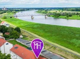 Barby-Apartment mit Elbblick und Balkon am Elbe-Saale-Radweg-1 Hund willkommen，位于Barby的酒店
