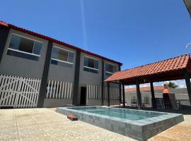 Casa de Praia pé na areia，位于卢塞纳的酒店