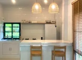 The Whispering Palm Coconut Lane