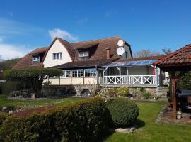Ferienhaus Hasenhügel mit Seeblick，位于施韦特的酒店