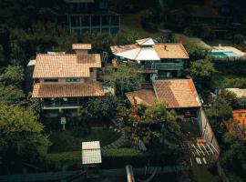 Pousada Minha Rosa Paixão - PRAIA DO ROSA, SC，位于因比图巴的酒店