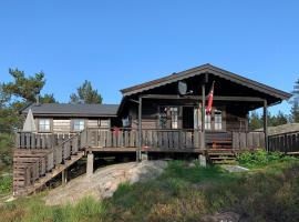 Traditional Family Cabin By Idyllic Tarn，位于Fossdal的酒店