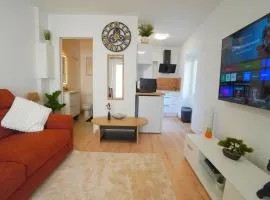 Studio neuf parking gratuit 15 minutes de Lyon