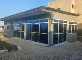 TR Beach Apartments - Uroa Beachfront Bliss Modern 1BR Oceanview Retreat