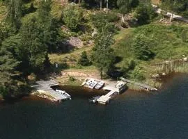 Accommodation near lake and forest including rowing boat