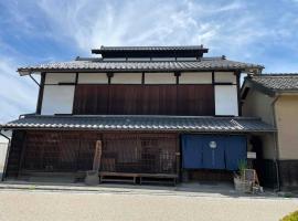 まるごと，位于Tomi的酒店