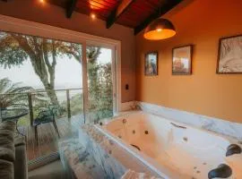 Cabana romântica com Jacuzzi ao lado de Gramado