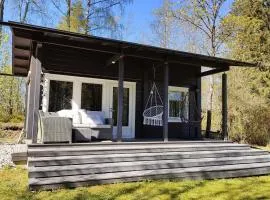 Three cozy cottages, sauna and big yard all included for up to 8 persons