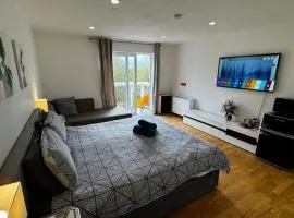 En-suite room with a superking size bed and balcony