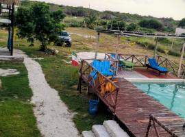 Camping y Cabañas Chelem，位于车勒姆的酒店